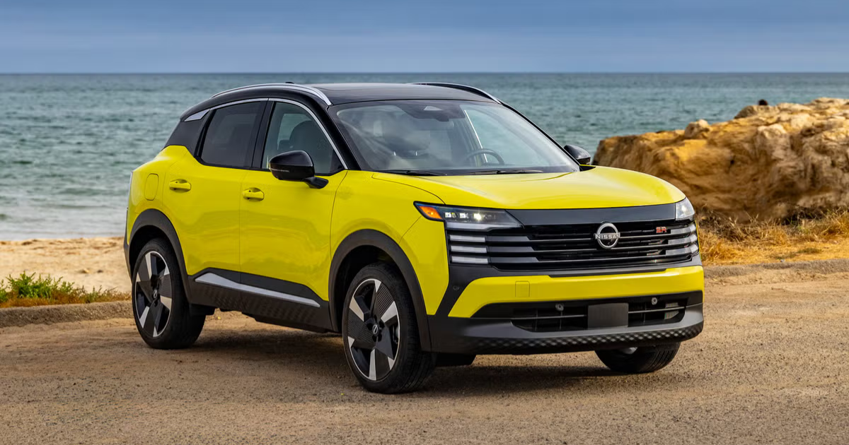 a yellow 2026 Nissan Kicks parked at a beachfront